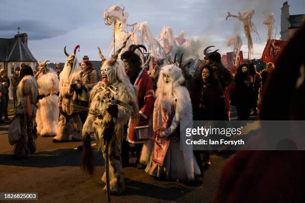 Participants parade through the streets during the annual Whitby Krampus run on December 02, 2023 in Whitby, England. The Whitby Krampus Run is a...