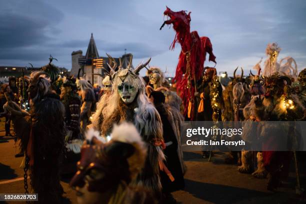 Participants parade through the streets during the annual Whitby Krampus run on December 02, 2023 in Whitby, England. The Whitby Krampus Run is a...