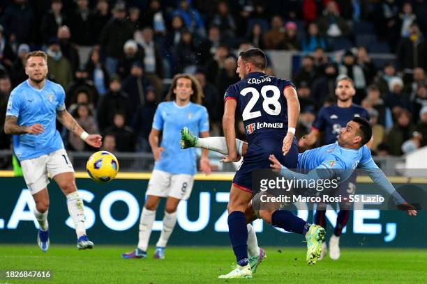 Pedro Rodriguez of SS Lazio competes for the ball with Gianluca Zappa of Cagliari Calcio during the Serie A TIM match between SS Lazio and Cagliari...