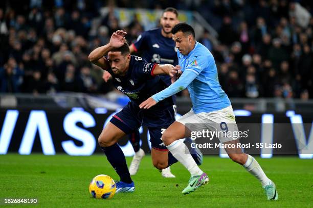 Pedro Rodriguez of SS Lazio competes for the ball with Gianluca Lapadula of Cagliari Calcio during the Serie A TIM match between SS Lazio and...