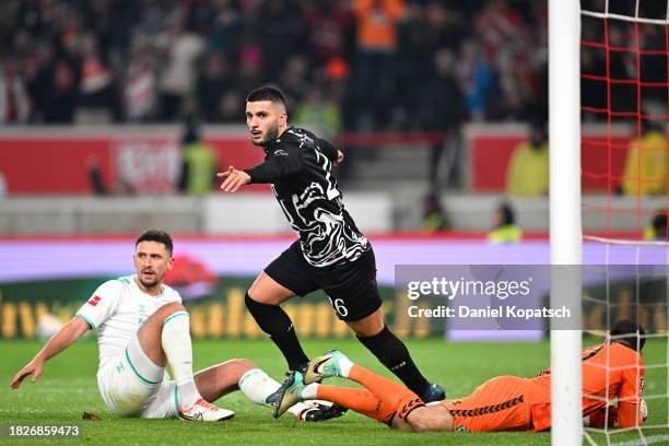 Deniz Undav of VfB Stuttgart celebrates after scoring the team's first goal during the Bundesliga match between VfB Stuttgart and SV Werder Bremen at...