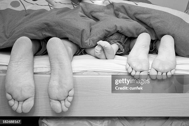 feet in black and white - black feet couple stock pictures, royalty-free photos & images