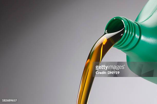 motor oil - lubrication stock pictures, royalty-free photos & images