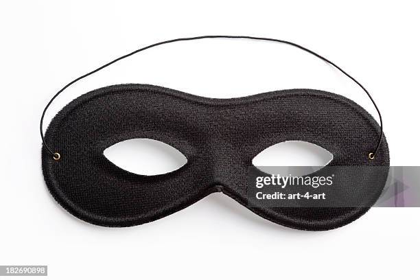 black carnival mask on white background - masquerade ball stock pictures, royalty-free photos & images