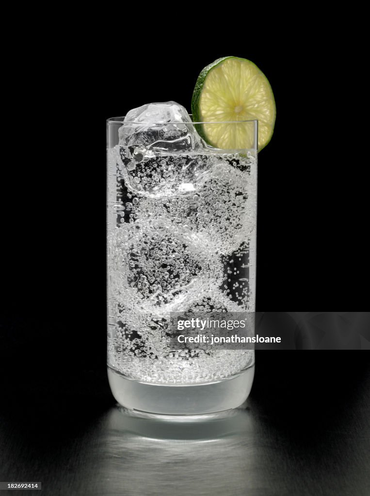 Gin and Tonic Cocktail on black background