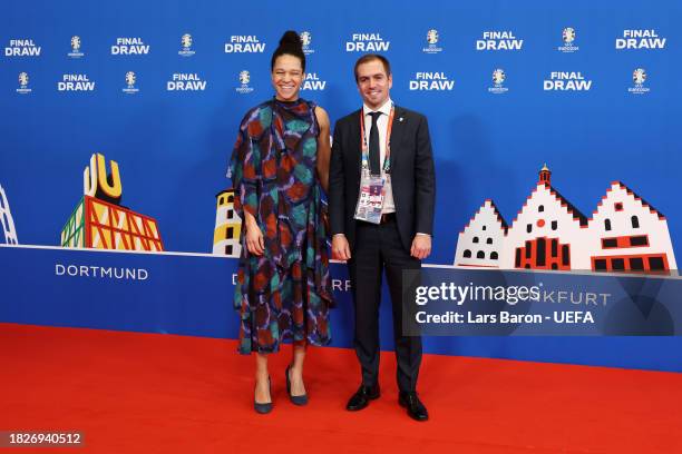 Former Footballers, Celia Sasic and Philipp Lahm arrive prior to the UEFA EURO 2024 Final Tournament Draw at Elbphilharmonie on December 02, 2023 in...