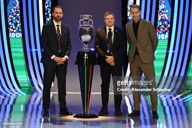 Gareth Southgate, Manager of England, Dragan Stojkovic, Head Coach of Serbia, and Kasper Hjulmand, Head Coach of Denmark, pose for a photo with the...