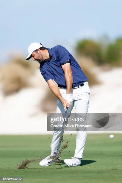 Scottie Scheffler of the United States plays a shot on the fourth hole during the third round of the Hero World Challenge at Albany Golf Course on...