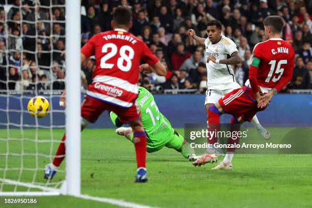 Rodrygo of Real Madrid scores the team's second goal during the LaLiga EA Sports match between Real Madrid CF and Granada CF at Estadio Santiago...
