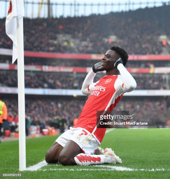 Bukayo Saka celebrates scoring the 1st Arsenal goal during the Premier League match between Arsenal FC and Wolverhampton Wanderers at Emirates...
