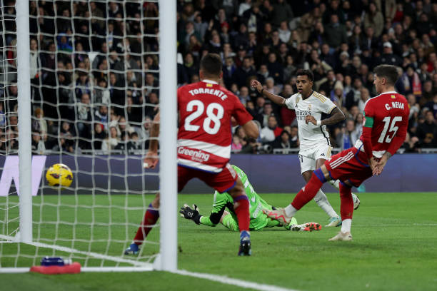 Rodrygo Goes of Real Madrid CF scores their second goal during the LaLiga EA Sports match between Real Madrid CF and Granada CF at Estadio Santiago...