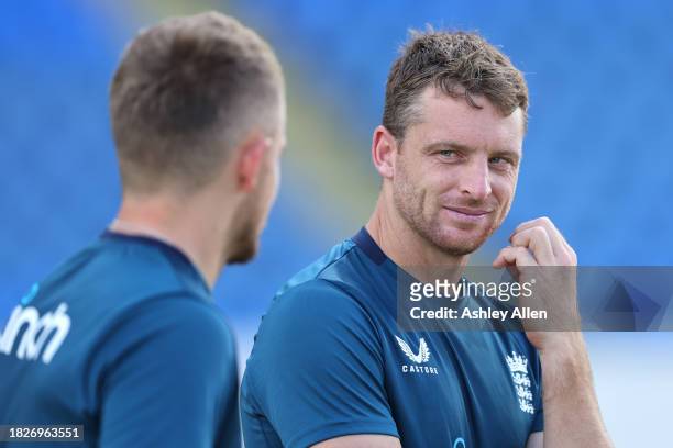Jos Buttler and Sam Curran of England chat during a Nets and Training session ahead of the first ODI during CG United One Day International series at...
