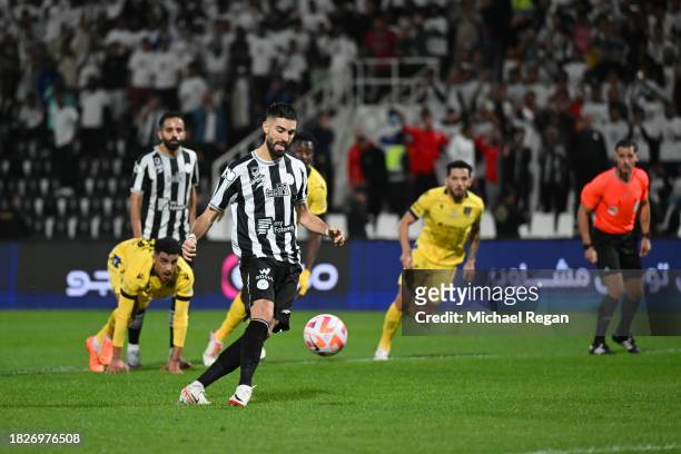 Yannick Carrasco of Al-Shabab scores a penalty to make it 1-0 during the Saudi Pro League match between Al-Shabab and Al-Taawoun at Al-Shabab Club...