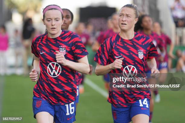 Rose Lavelle and Emily Sonnett of the United States during warmups prior to playing China PR during an international friendly at DRV PNK Stadium on...