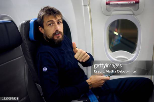 Francesco Acerbi of FC Internazionale gestures on the plane during the Inter travel to Naples at Malpensa Airport on December 02, 2023 in Milan,...