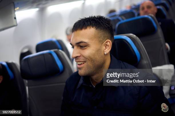 Lautaro Martinez of FC Internazionale gestures on the plane during the Inter travel to Naples at Malpensa Airport on December 02, 2023 in Milan,...