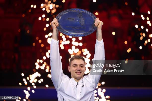 Hamad Medjedovic of Serbia lifts the Next Gen ATP Finals Trophy after winning the final against Arthur Fils of France during day five of the Next Gen...