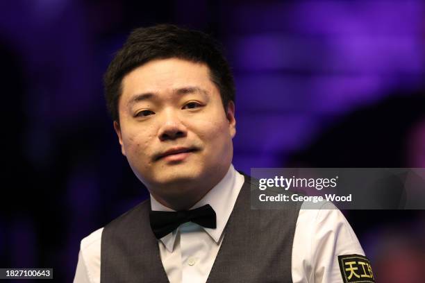 Ding Junhui of China reacts against Judd Trump of England in their Semi Final match on Day Eight of the MrQ UK Snooker Championship 2023 at York...