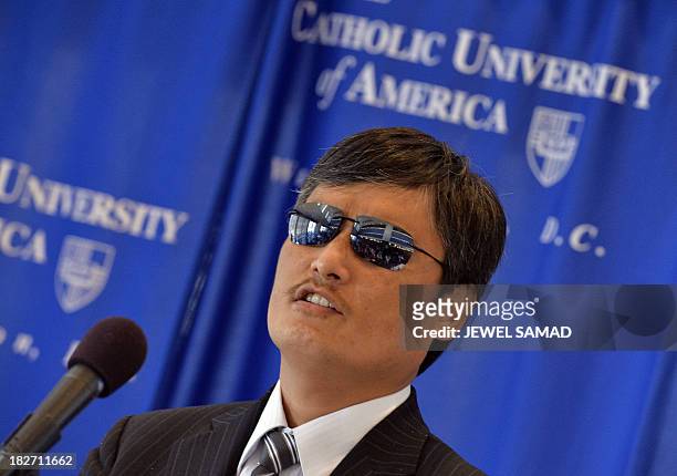 Chen Guangcheng, the Chinese activist who dramatically escaped house arrest, speaks during a ceremony in Washington, DC, on October 2, 2103....