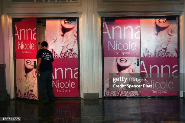 Advertising for New York City Opera's performance of "Anna Nicole" is seen at the Brooklyn Academy of Music where it performed until recently on...