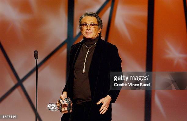 Producer Robert Evans accepts an award during the 14th Annual Producers Guild Awards at the Century Plaza Hotel on March 2, 2003 in Los Angeles,...