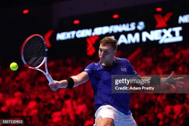 Hamad Medjedovic of Serbia plays a backhand to Arthur Fils of France in the final during day five of the Next Gen ATP Finals at King Abdullah Sports...