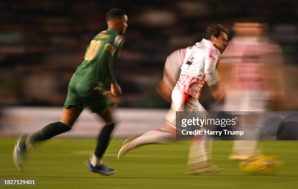 Ben Pearson of Stoke City battles for possession with Morgan Whittaker of Plymouth Argyle during the Sky Bet Championship match between Plymouth...