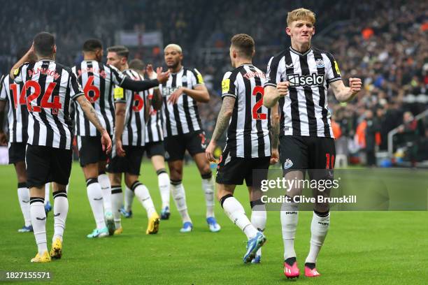 Anthony Gordon of Newcastle United celebrates after scoring the team's first goal during the Premier League match between Newcastle United and...