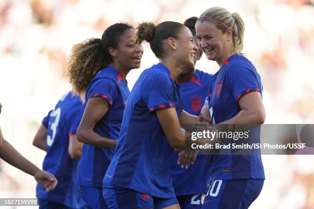 Lindsey Horan of the United States celebrates a goal with teammates during the second half of an international friendly against China PR at DRV PNK...