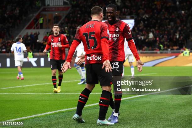 Fikayo Tomori of AC Milan celebrates with teammate Luka Jovic after scoring the team's third goal during the Serie A TIM match between AC Milan and...