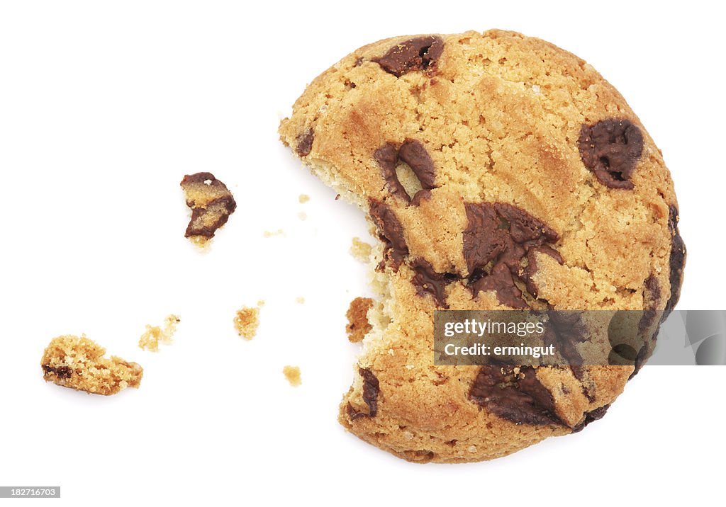 Half eaten chocolate chip cookie isolated on white