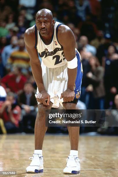 Michael Jordan of the Washington Wizards waits for play during the NBA game against the New Jersey Nets at the MCI Center on February 21, 2003 in...