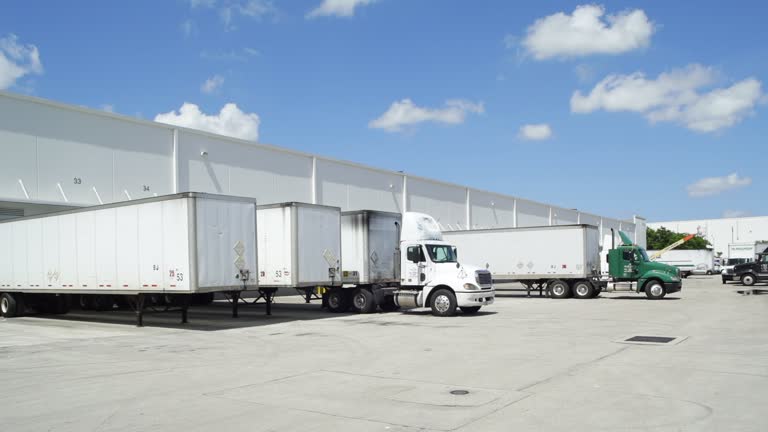 https://media.gettyimages.com/id/1827193592/video/warehouse-loading-dock-with-trucks.jpg?b=1&s=640x640&k=20&c=DX7QLpEh6HTT3m_Qm-Vz25zziwtzylSO114o4Jon37M=