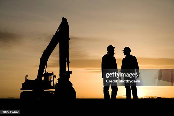 construction workers and equipment - yellow work helmet stock pictures, royalty-free photos & images
