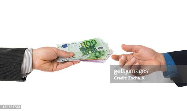 a financial transaction between two parties - hand take stock pictures, royalty-free photos & images