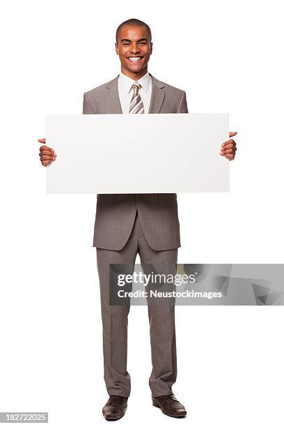 young adult businessman with blank sign. isolated. - blank sign stock pictures, royalty-free photos & images