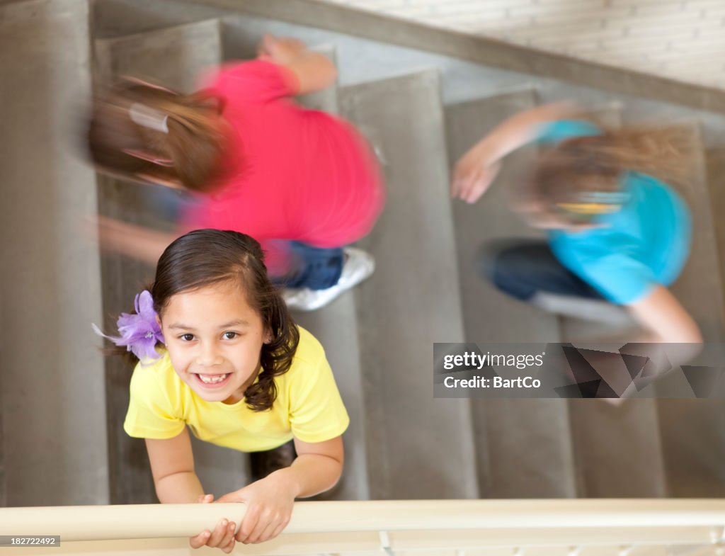 Young girl in staircase