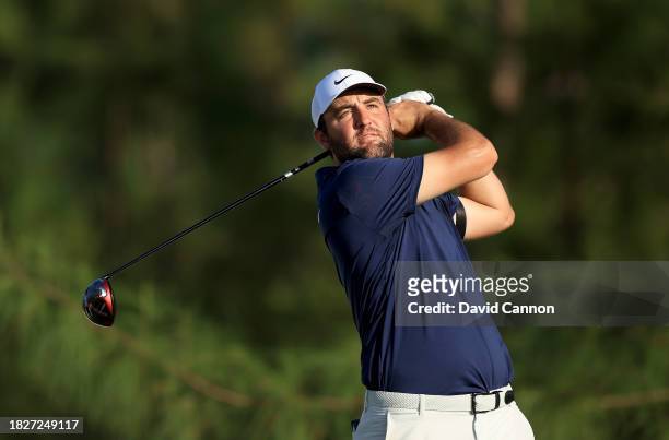 Scottie Scheffler of the United States plays his tee shot on the 13th hole during the third round of the Hero World Challenge at Albany Golf Course...