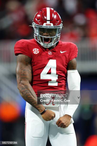 Jalen Milroe of the Alabama Crimson Tide celebrates after passing for a touchdown during the second quarter against the Georgia Bulldogs in the SEC...
