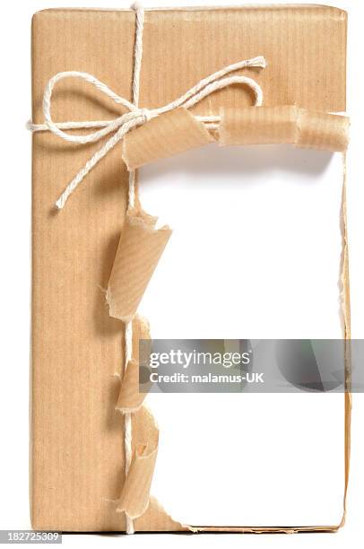 opened, brown wrapped parcel - torn gift stock pictures, royalty-free photos & images