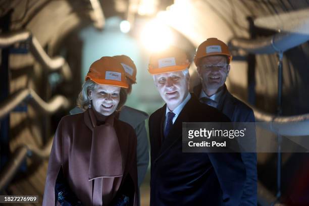 King Philippe of Belgium and Queen Mathilde of Belgium visit the tunnel of the 380 kV cable diagonal at the 50Hertz Netzquartier on December 6, 2023...