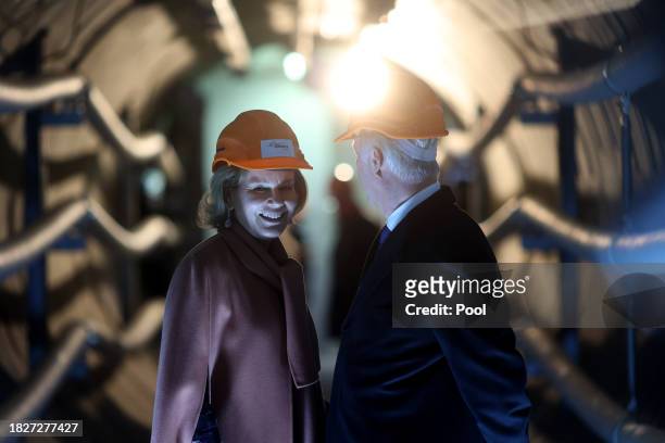 King Philippe of Belgium and Queen Mathilde of Belgium visit the tunnel of the 380 kV cable diagonal at the 50Hertz Netzquartier on December 6, 2023...