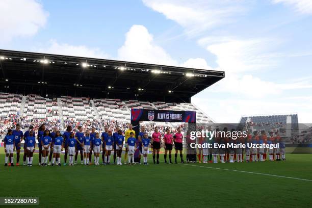 Players of China and United States line up prior to a match between China and United States at DRV PNK Stadium on December 02, 2023 in Fort...