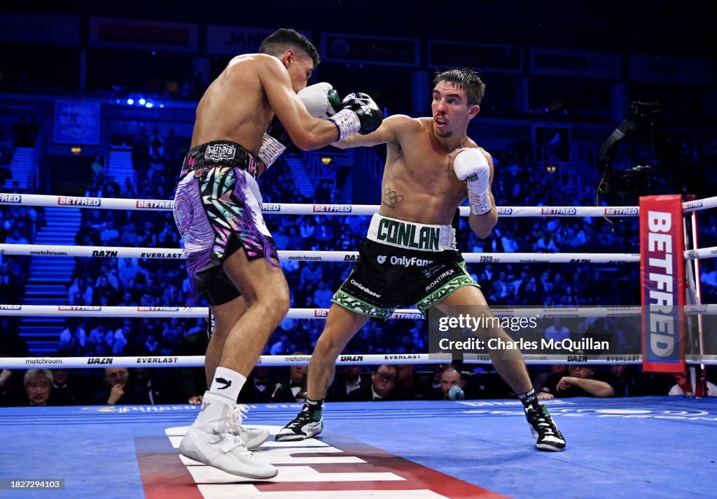 Jordan Rutter Boxing Michael Conlan exchanges punches with Jordan Gill during the WBA ...