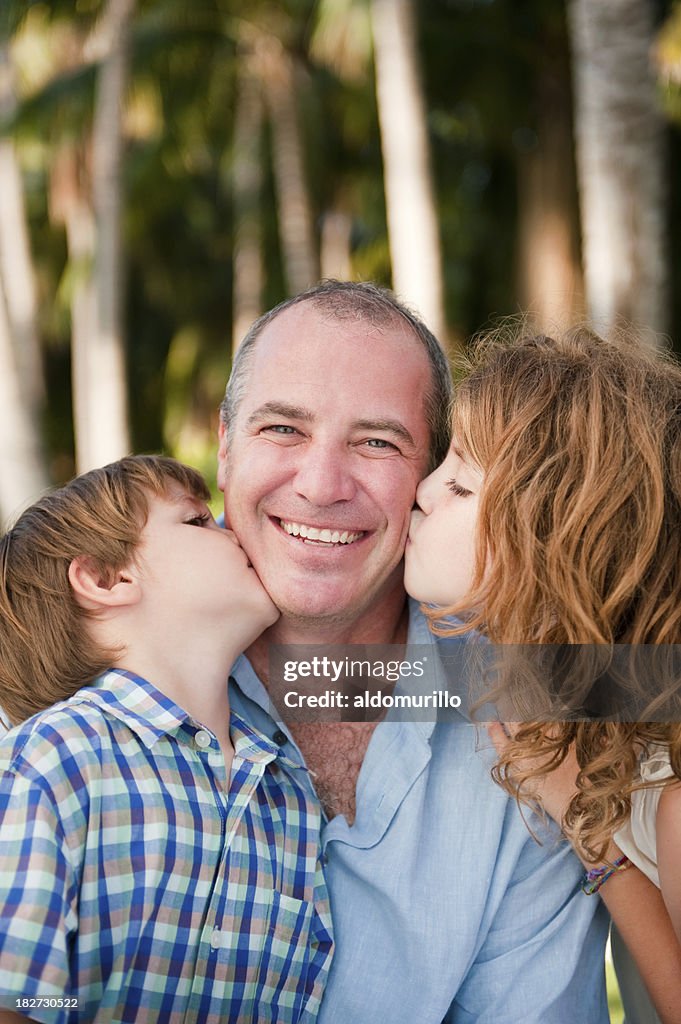 Cute father and children