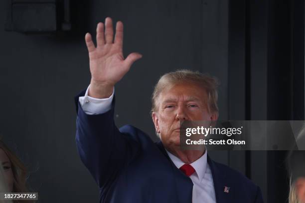 Republican presidential candidate former President Donald Trump leaves a commit to caucus campaign event at the Whiskey River bar on December 02,...