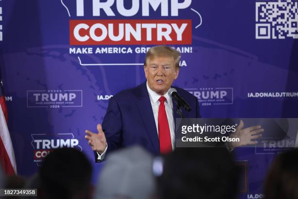 Republican presidential candidate former President Donald Trump speaks at a commit to caucus campaign event at the Whiskey River bar on December 02,...