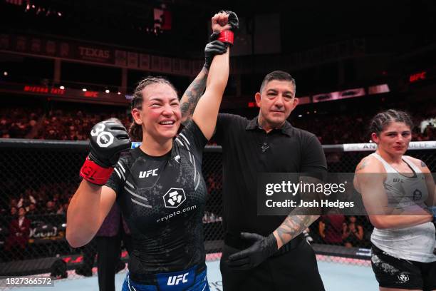 Miesha Tate reacts after her submission victory over Julia Avila in a bantamweight fight during the UFC Fight Night event at Moody Center on December...