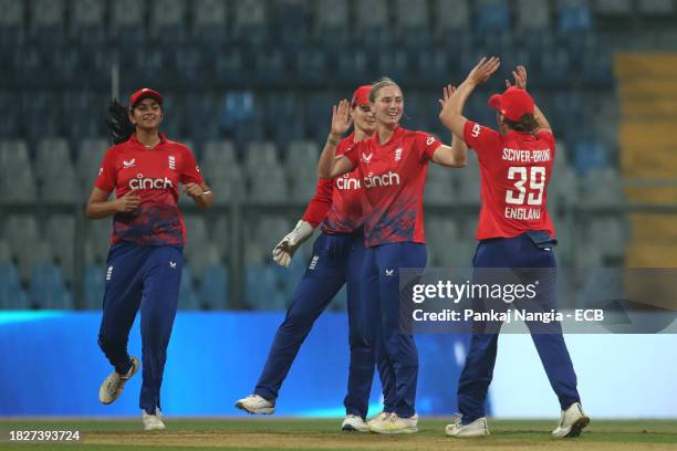 Freya Kemp of England celebrates the wicket of Jemimah Rodrigues of India during the 1st T20 International match between India Women and England...