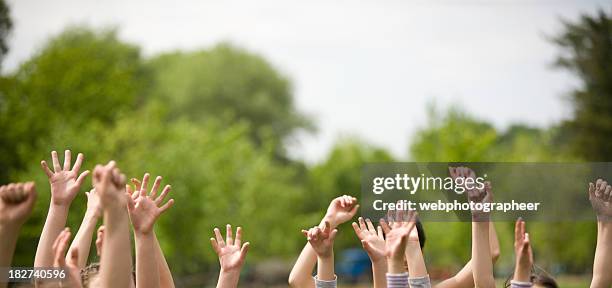 children waving - hi 5 stock pictures, royalty-free photos & images